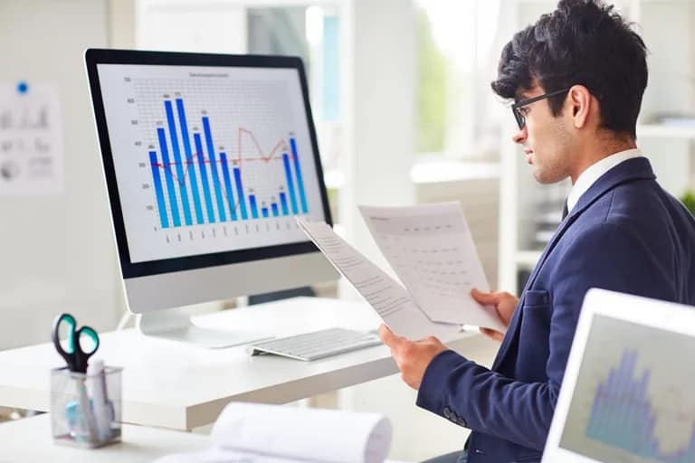 Scholar analyzing research data in online doctorate course