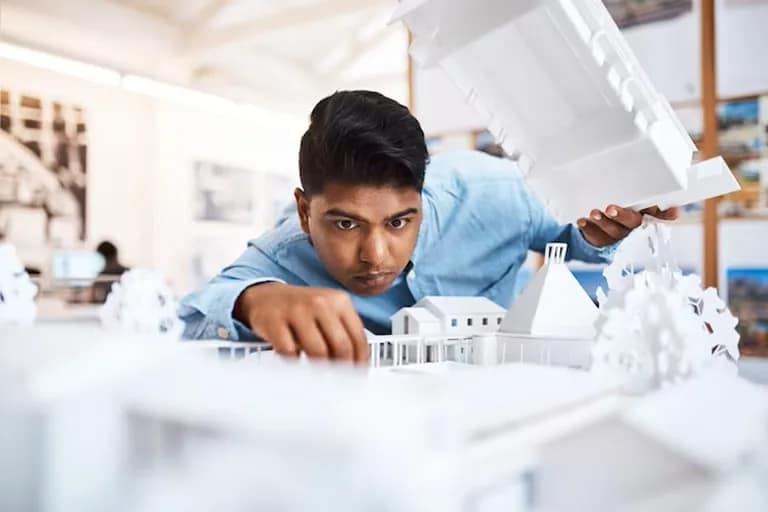 MTech student working on advanced engineering projects in a modern university laboratory