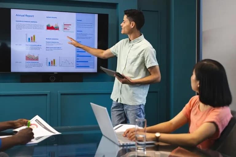 MBA students discussing business strategy in a modern university classroom