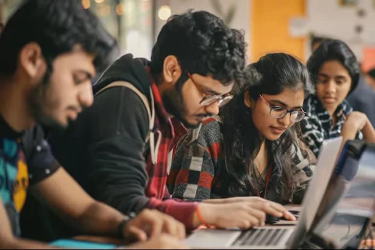 University students studying computer science and technology courses in a BSc classroom